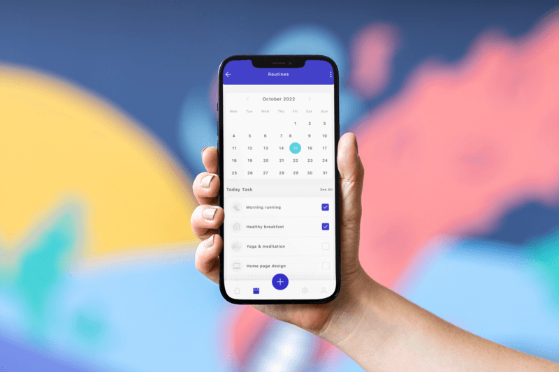 An Iphone Mockup For A Productivity App Featuring A Hand Holding It In Front Of A Colorful Wall