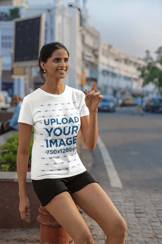 Gildan T Shirt Mockup Of A Woman Pointing At Something On The Street