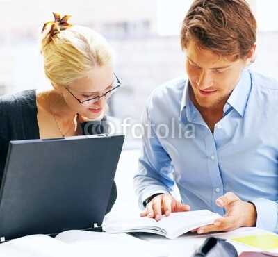 Stock Photo Featuring a Woman and Man Working