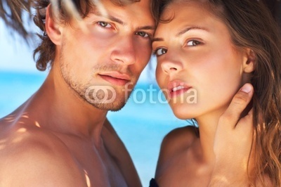 Stock Photo of an Attractive Couple at the Beach