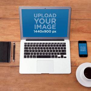 Mockup Of A Macbook And An Iphone Placed Over A Wooden Table Featuring A Cup Of Coffee