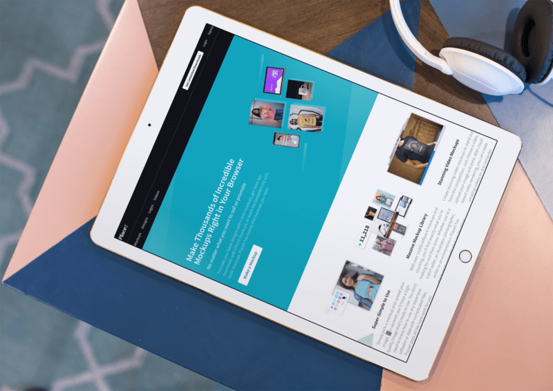 Mockup Of An Ipad Lying On The Corner Of A Multicolor Table