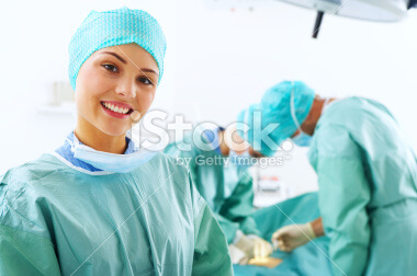 stock photo close up of a nurse standing in an operating room
