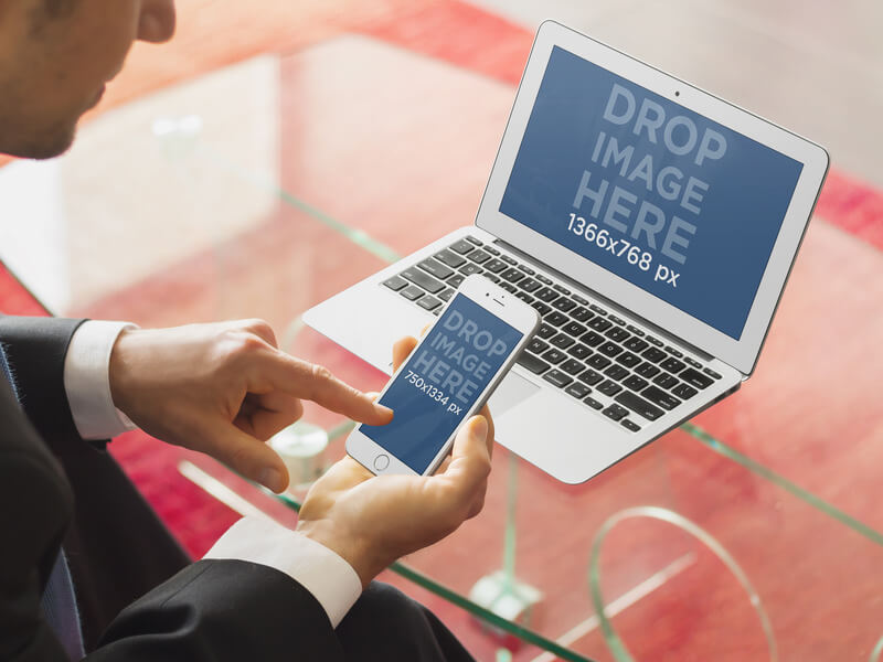 businessman-with-macbook-and-iphone-6