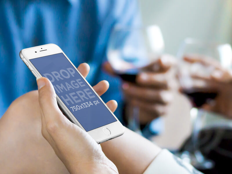 default_stillshot-apple-iphone-6-couple-using-iphone-with-wine-base