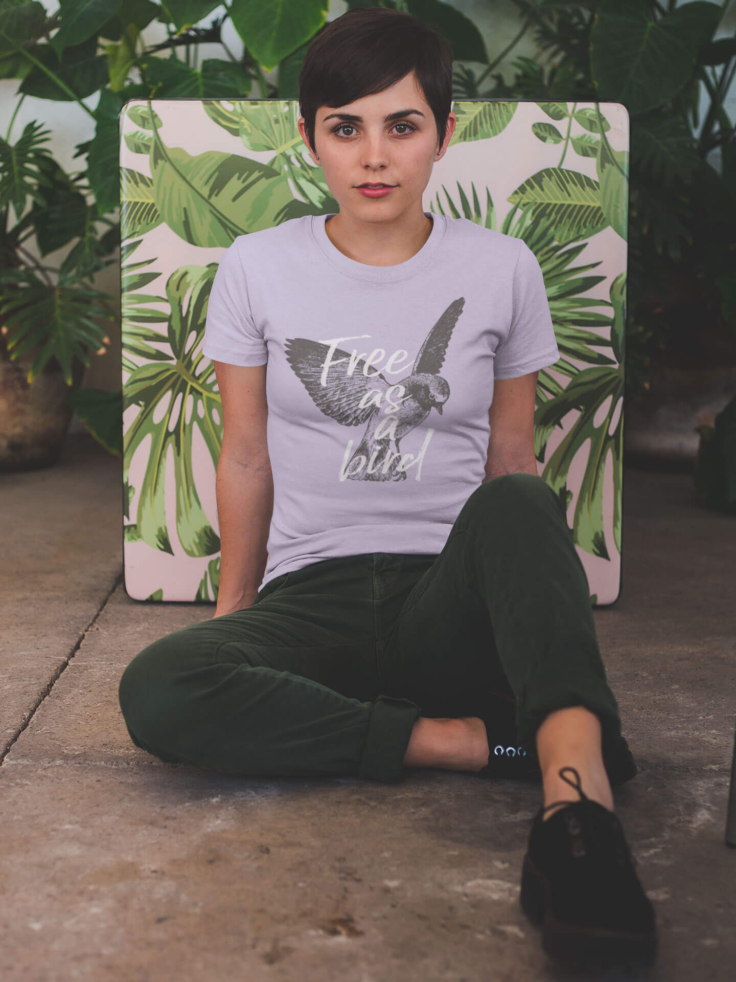 A short hair girl wearing a Tshirt-Mockup designed in Placeit