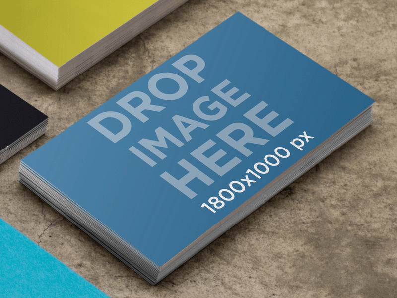 MOCKUP TEMPLATE OF BUSINESS CARD ON CONCRETE TABLE