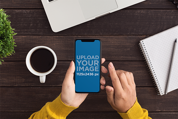 Mockup Of A Woman Using An Iphone 11 At Work