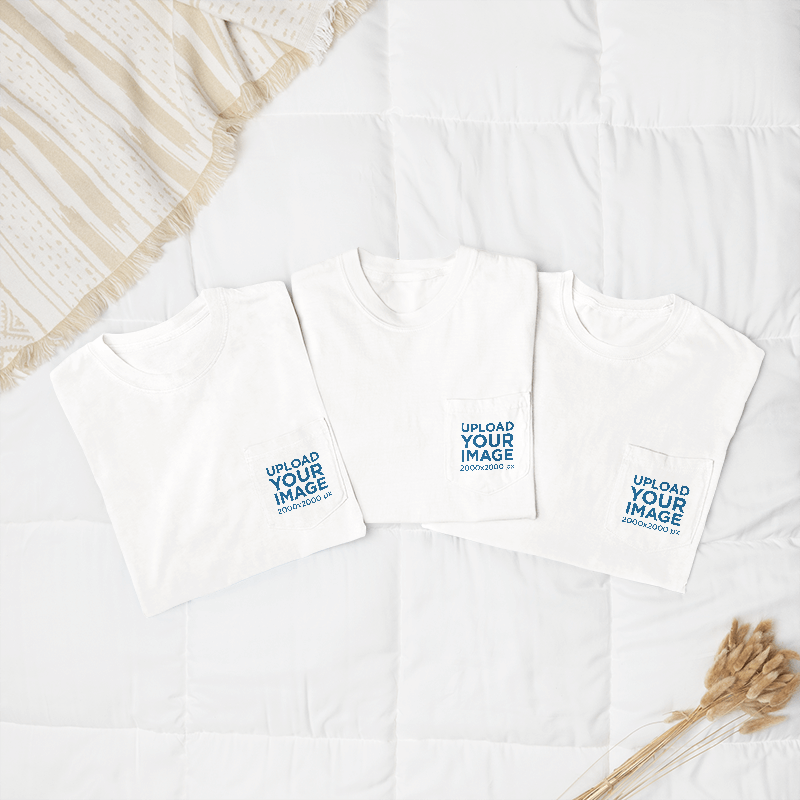 Mockup Of Three Folded Comfort Colors Pocket Tees Placed On A Cozy Bed