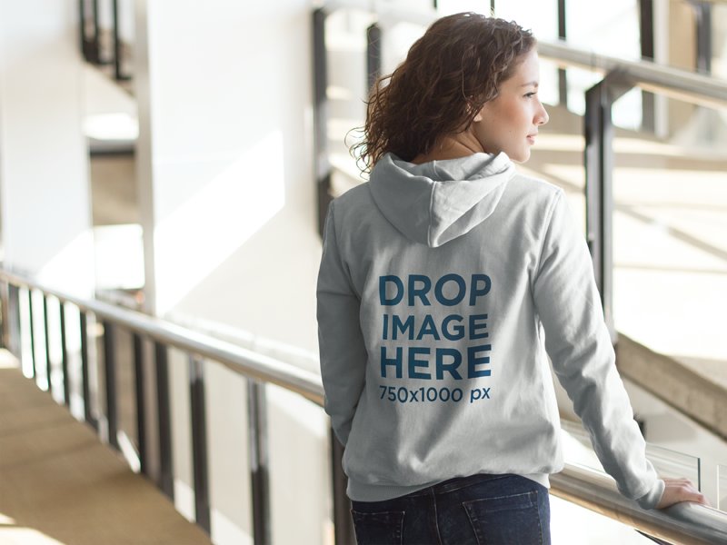 Hoodie Mockup of a Young Woman at a Library