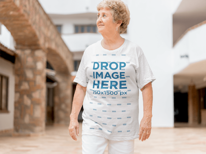 Smiling White Elderly Woman Wearing a T-Shirt Mockup