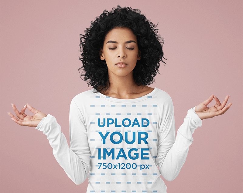 Long Sleeve Tee Mockup Featuring A Woman Meditating In A Studio