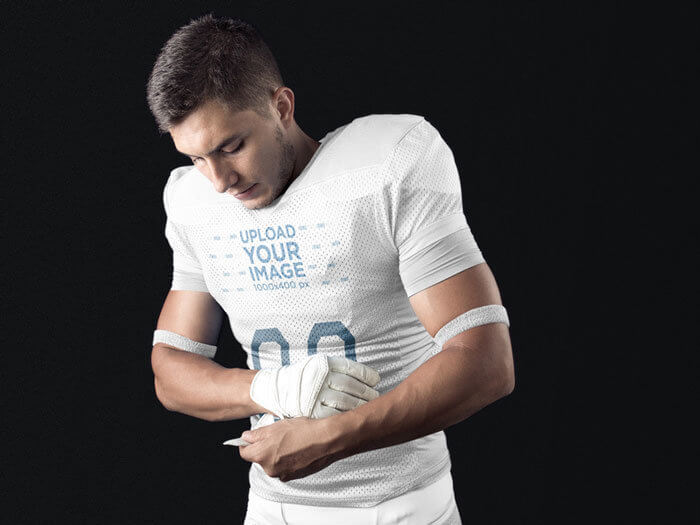 Mockup of a young man posing a football jersey 