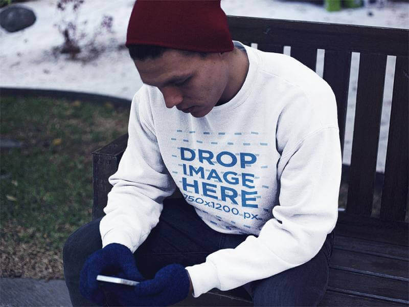 crewneck mockup of a young man sitting down