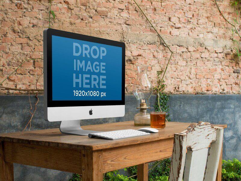 iMac mockup at a rustic setting