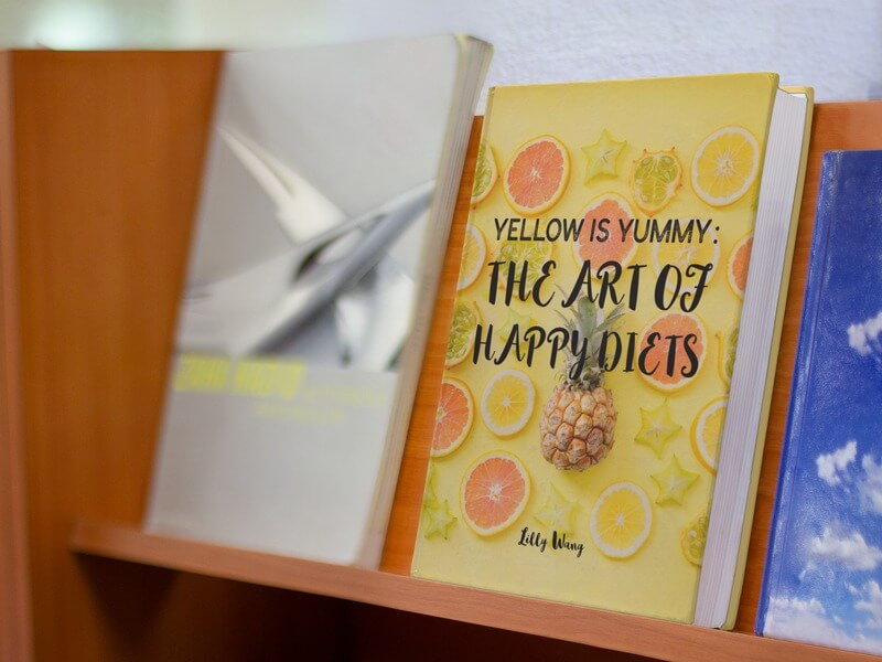 E Book Mockup Standing On A Shelf At A Bookstore