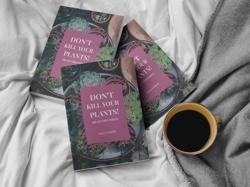 Three Messy Books Mockup On A Bed Near A Coffee Cup