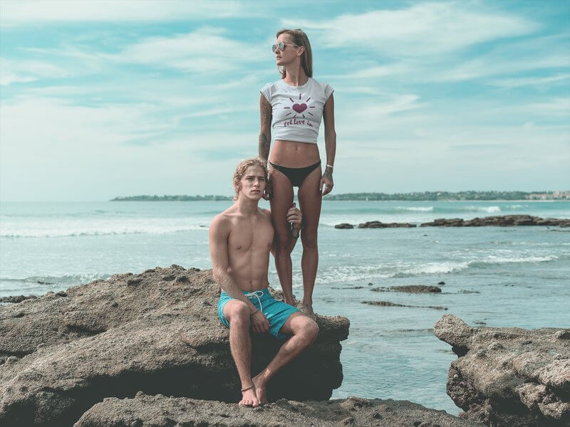 Woman Wearing A T Shirt Mockup With Her Boyfriend By The Sea