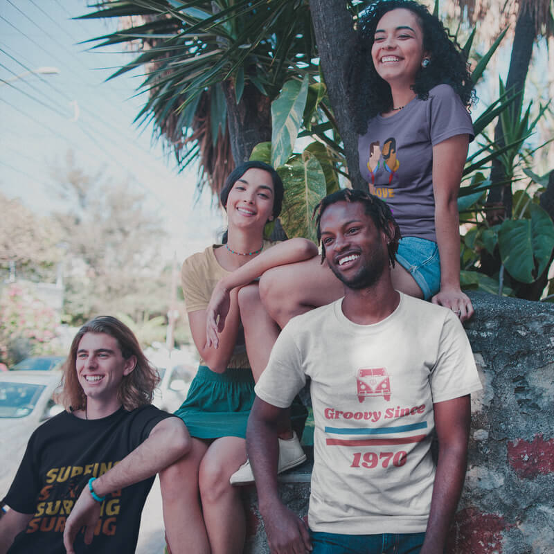 Four Friends Wearing Interracial Shirts Mockup Under Plants