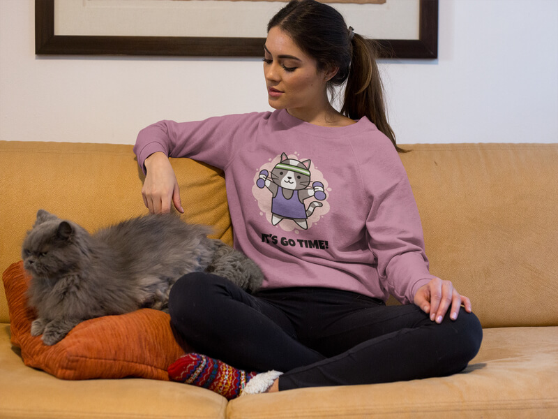 Beautiful Woman Wearing A Sweater Mockup With Her Grumpy Cat