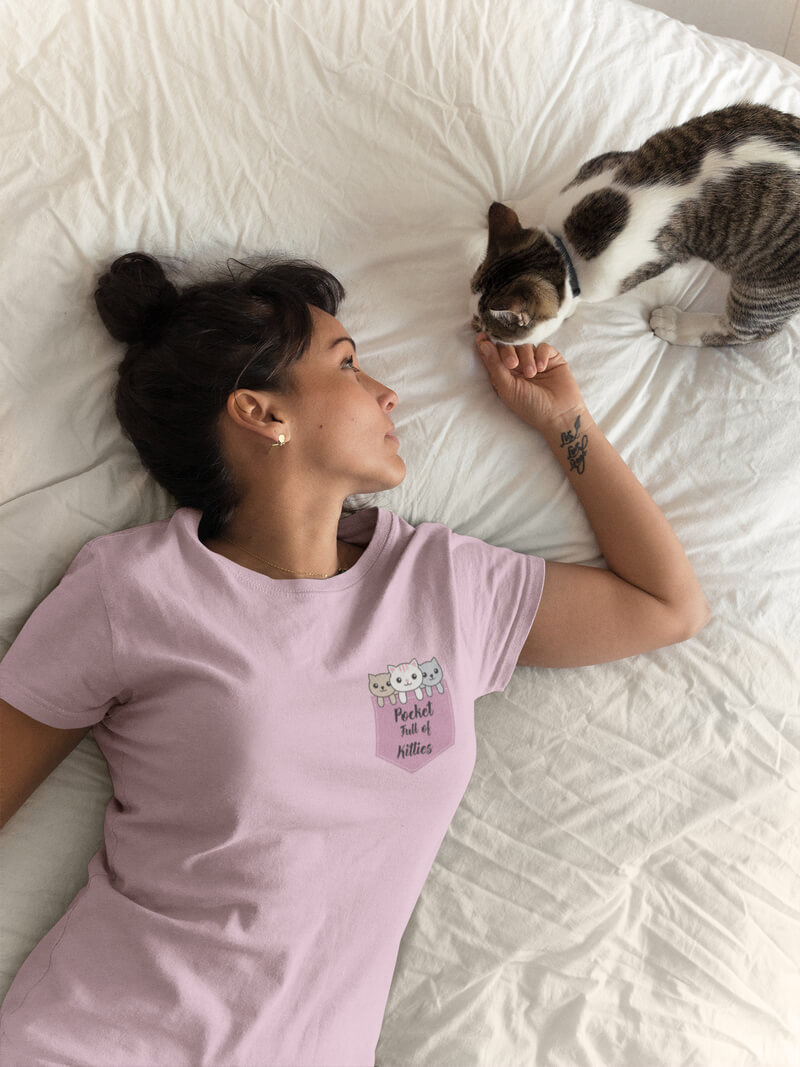 Tattooed Girl Wearing A T Shirt Mockup Petting Her Cat On The Bed