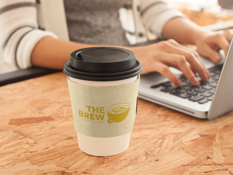 Coffee Shop Logo On A Coffee Sleeve Mockup