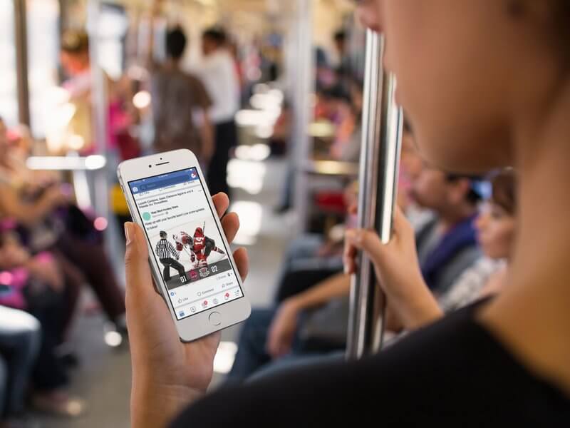 Iphone In Portrait Position Mockup Of A Woman Riding The Subway In The Morning