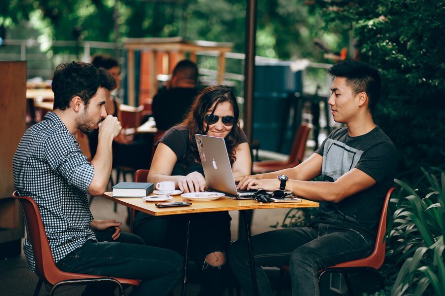 Group Of Friends Working