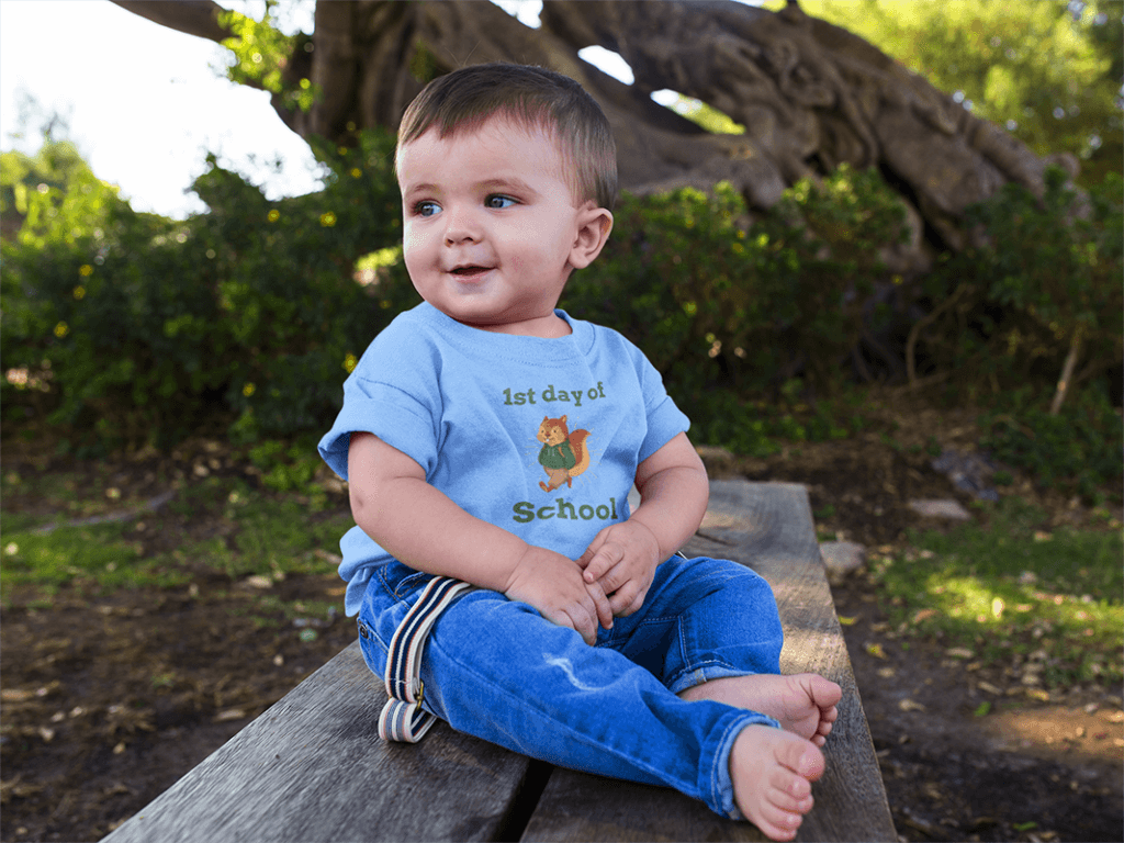 Cute Baby Boy Sitting Down In A Wooden Bench While Wearing A Round Neck Tshirt Template A16088