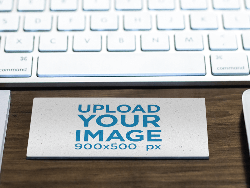 Mockup Of A Business Card In Landscape Position On Top Of A Desk