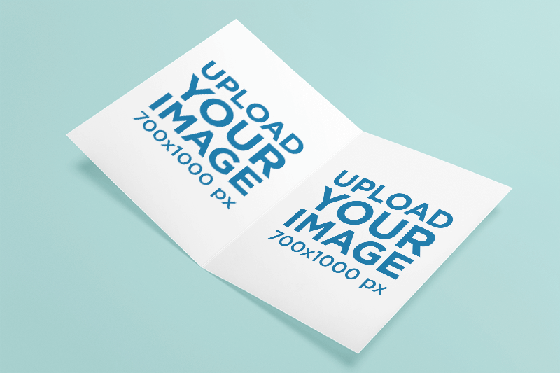 Mockup Of A Customizable Greeting Card Placed On A Solid Color Surface