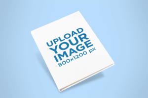 Mockup Of A Hardcover Book Angled Over A Colored Surface