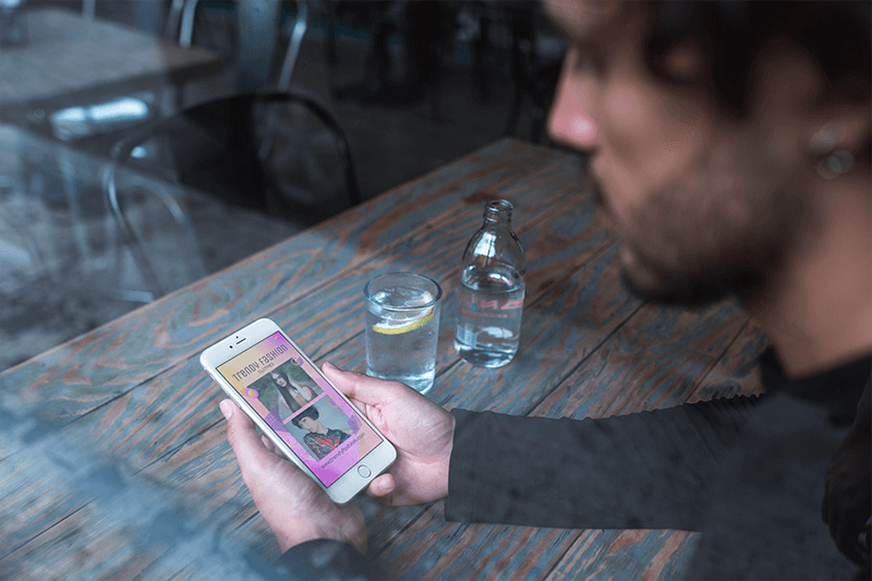 Through The Window Iphone Mockup Featuring A Man With Beard At A Restaurant A21603