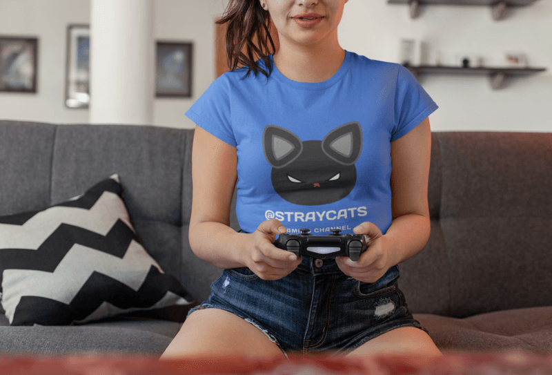 T Shirt Mockup Of A Female Gamer Playing In Her Living Room