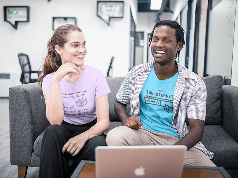 Interracial Group Of Friends Wearing T Shirts Mockup Having Fun At The Office