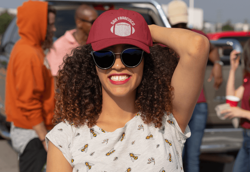 Dad Hat Mockup Of A Curly Haired Woman At A Tailgate Party