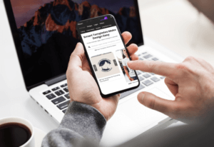 Mockup Of A Man Using His Iphone 11 Pro At The Office