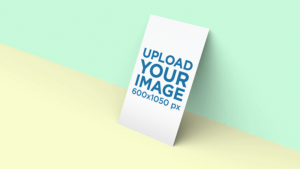 Business Card Mockup Standing Against A Two Color Background