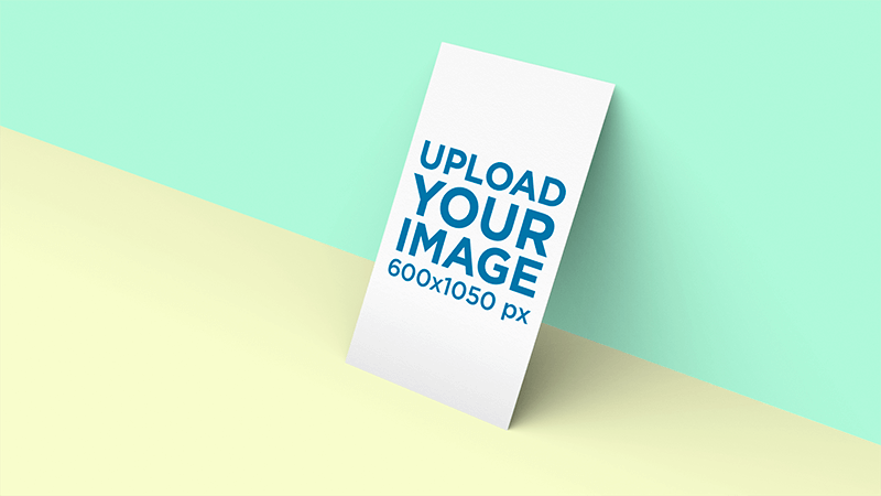 Business Card Mockup Standing Against A Two Color Background