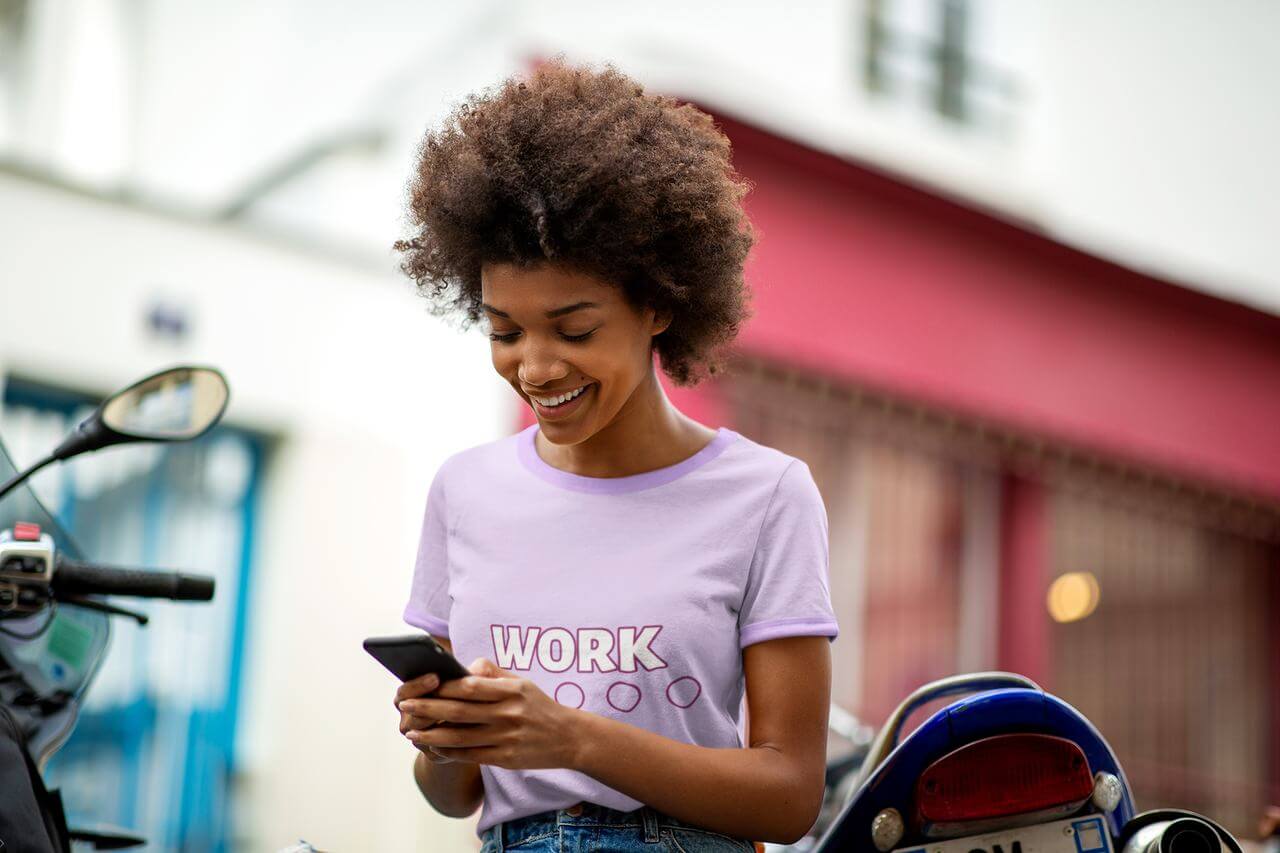 Mockup Of A Woman Reading About App Marketing Strategies