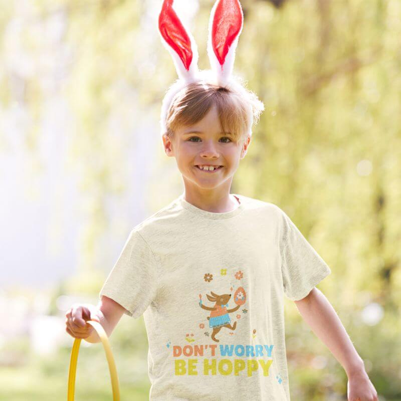 T Shirt Mockup Of A Boy Celebrating Easter Egg Hunt With Bunny Ears
