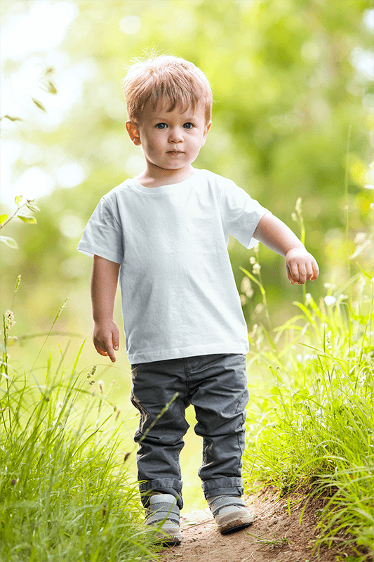 Mockup Of A Toddler Playing In The Grass