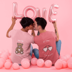 Back View Mockup Of A Couple Wearing T Shirts Surrounded By Balloons
