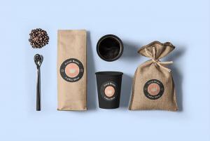 Coffee Bag Mockup Featuring A Paper Cup And A Burlap Bag