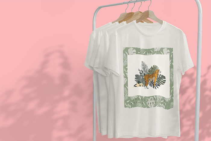 Mockup Of A Hanging T Shirt Featuring Tree Shadows In The Background