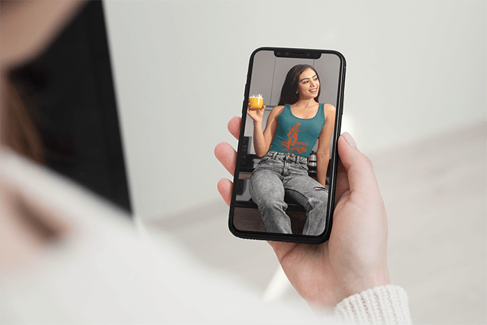 Mockup Of A Woman Holding An Iphone 11 Pro In Portrait Position