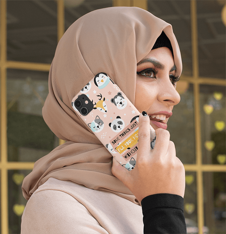 Phone Case Mockup Featuring A Woman With A Hijab Talking On The Phone 32414