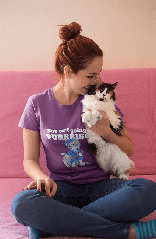 Red Head Woman Wearing A T Shirt Mockup While Holding Her Cat