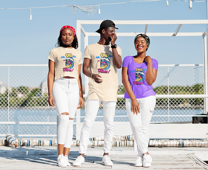 T Shirt Mockup Featuring A Group Of Friends Wearing White Pants