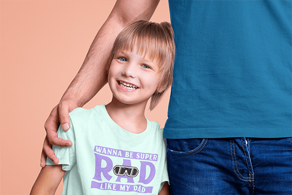 T Shirt Mockup Featuring A Happy Kid Posing At A Studio With His Father